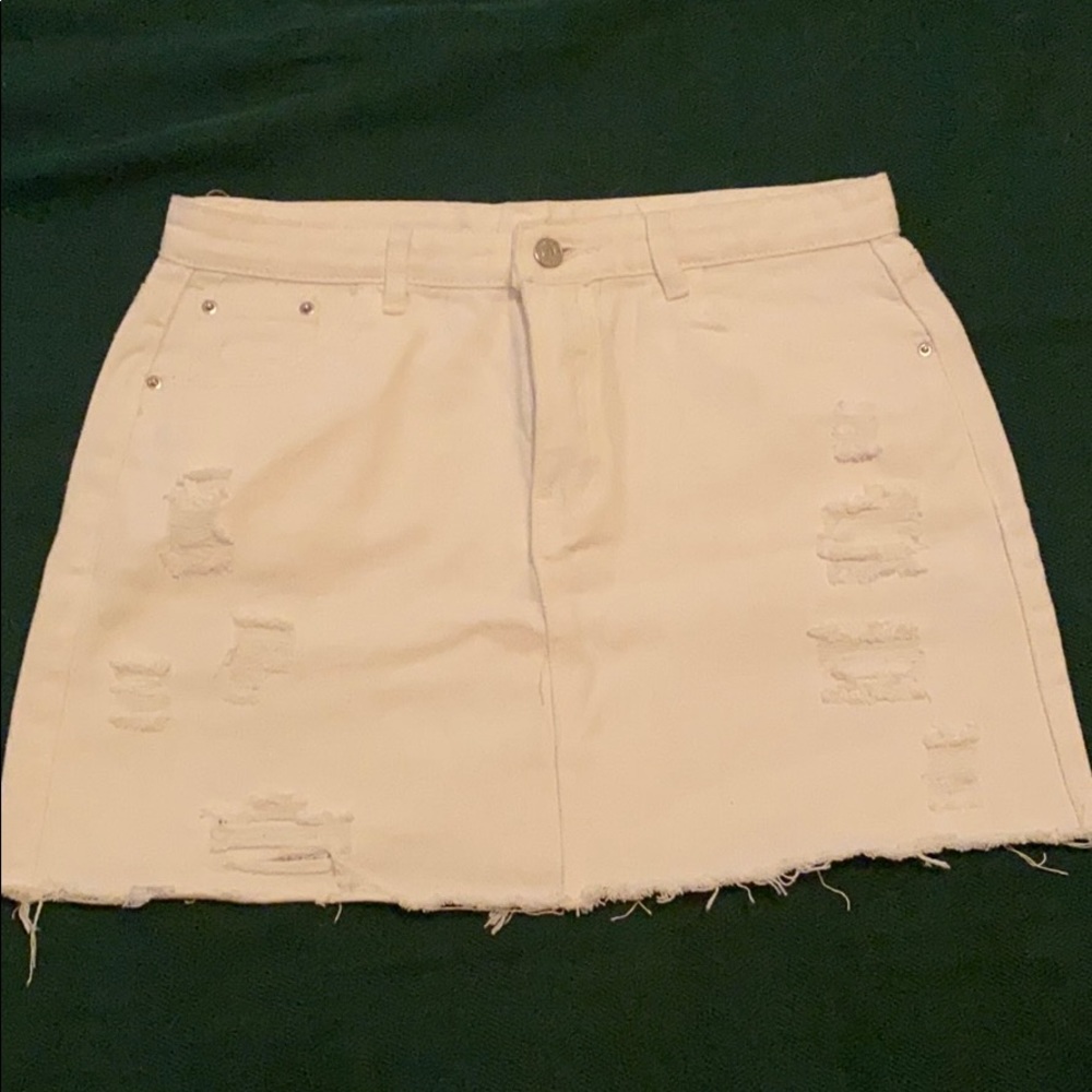 Distressed White jean mini skirt